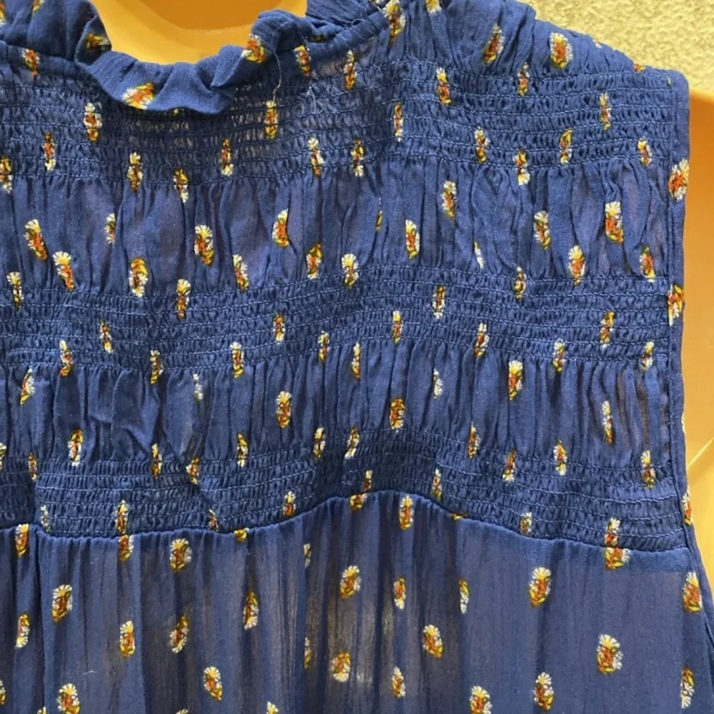Rewind Royal Blue Sleeveless Floral Blouse with Patterned Hem